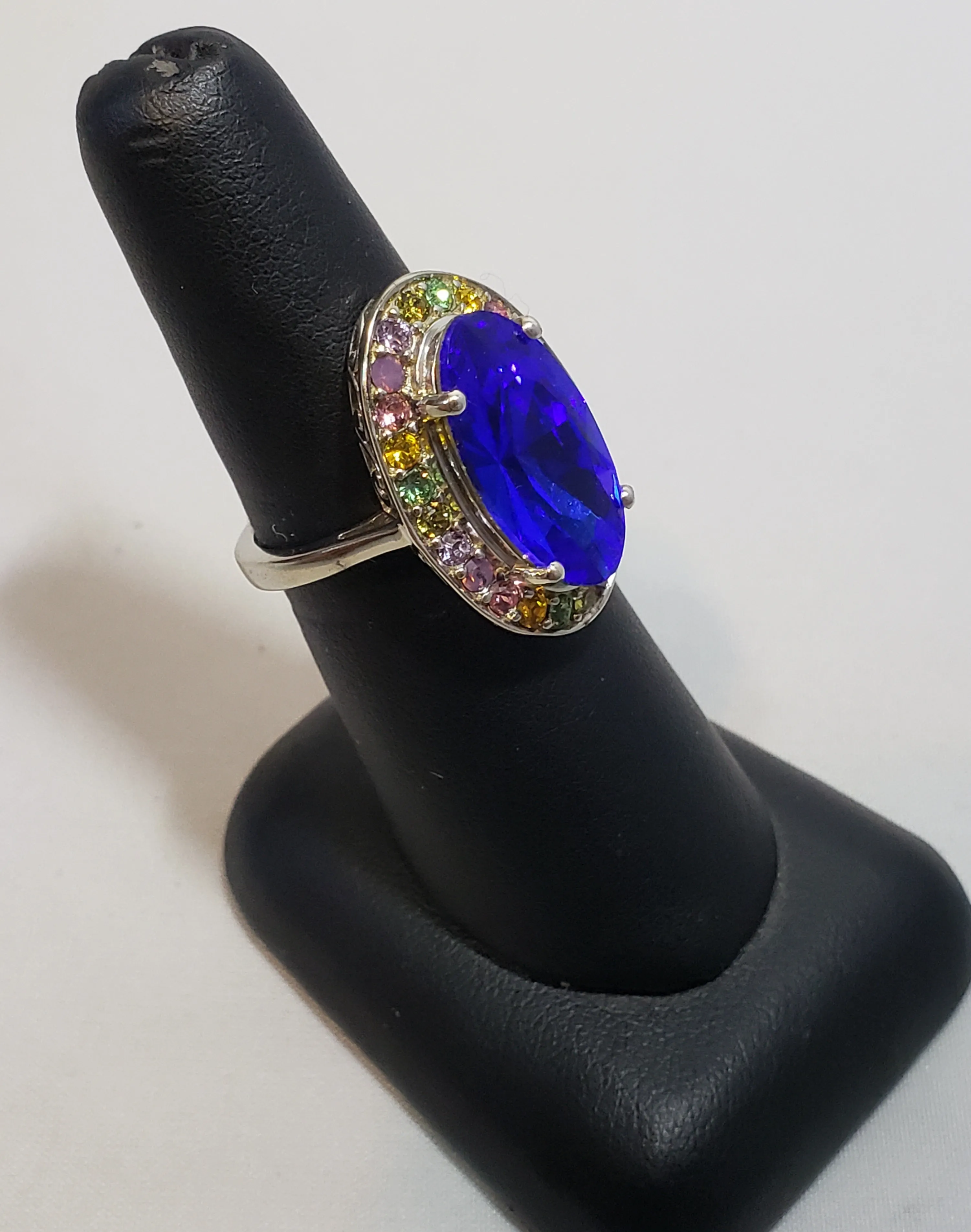 Size 7 Multi Color Swarovski Crystal Halo Ring with Large Blue Center Crystal, set in Platinum over 925 Sterling Silver