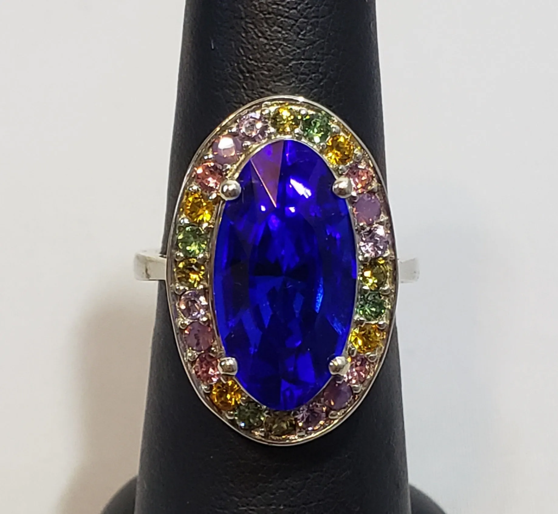 Size 7 Multi Color Swarovski Crystal Halo Ring with Large Blue Center Crystal, set in Platinum over 925 Sterling Silver